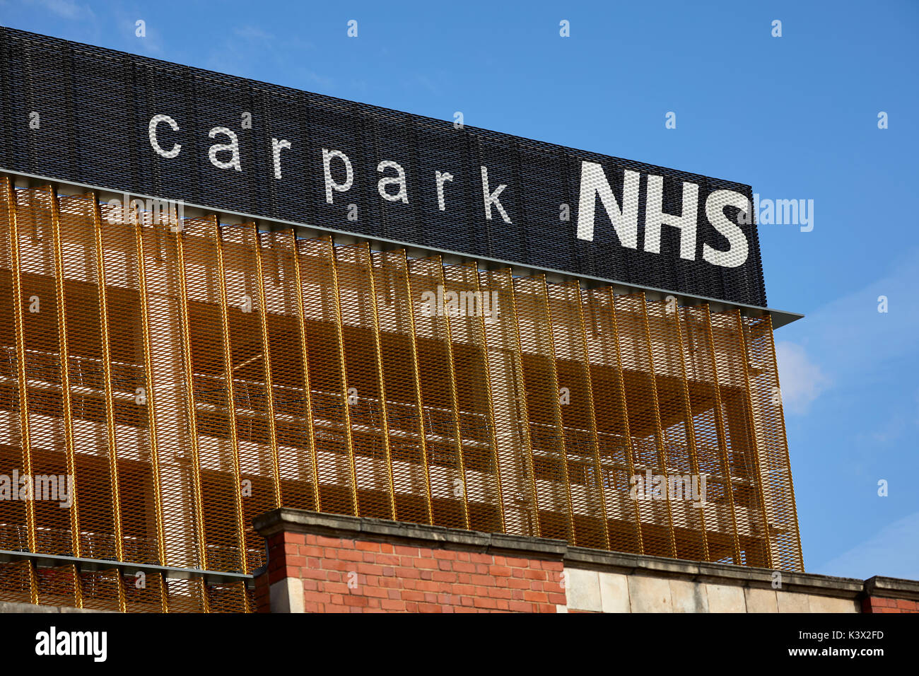 Modern designed carpark Central Manchester University Hospitals NHS Foundation Trust Wilmslow Road South Manchester Stock Photo