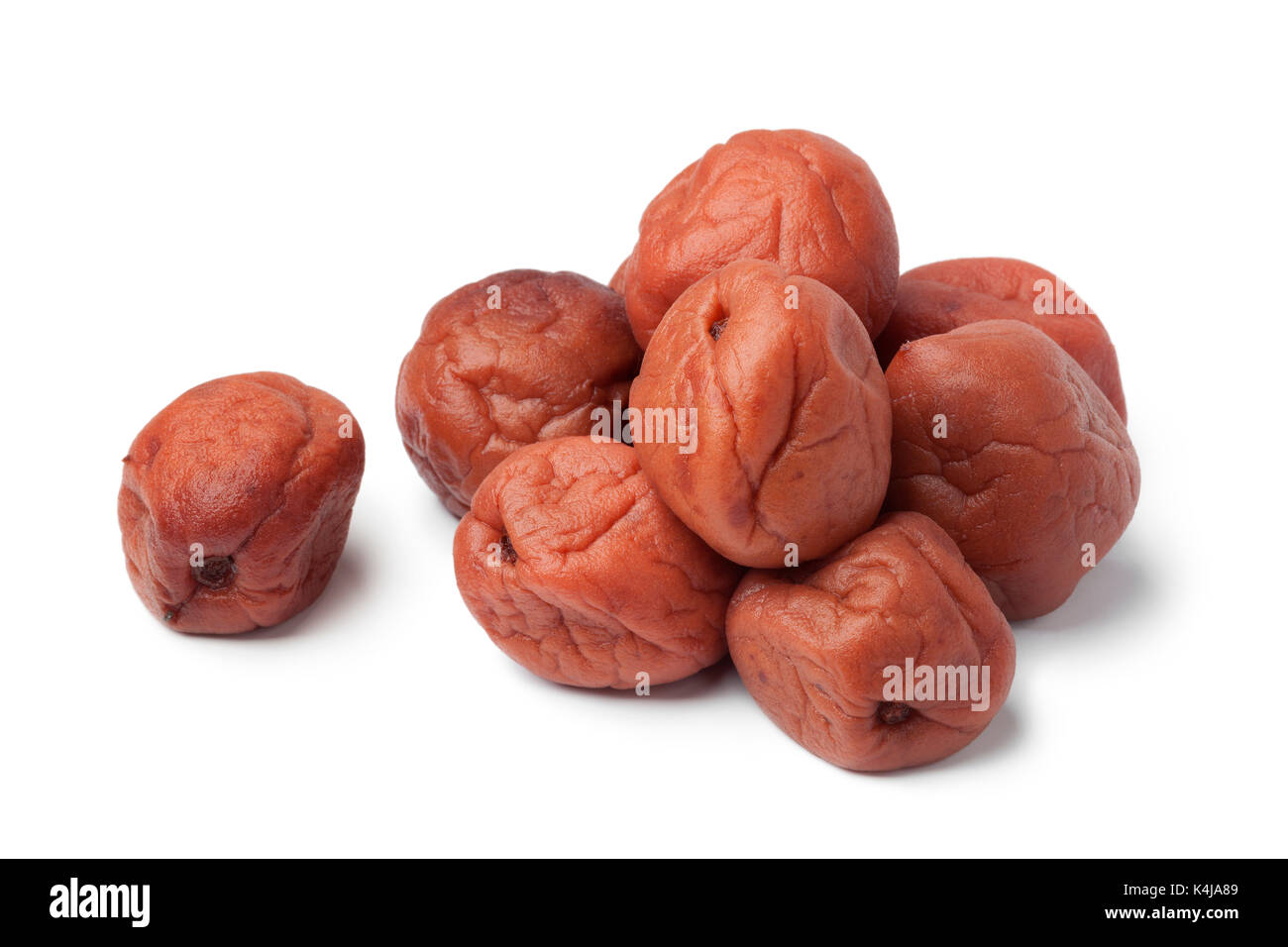 Traditional Japanese umeboshi on white background Stock Photo