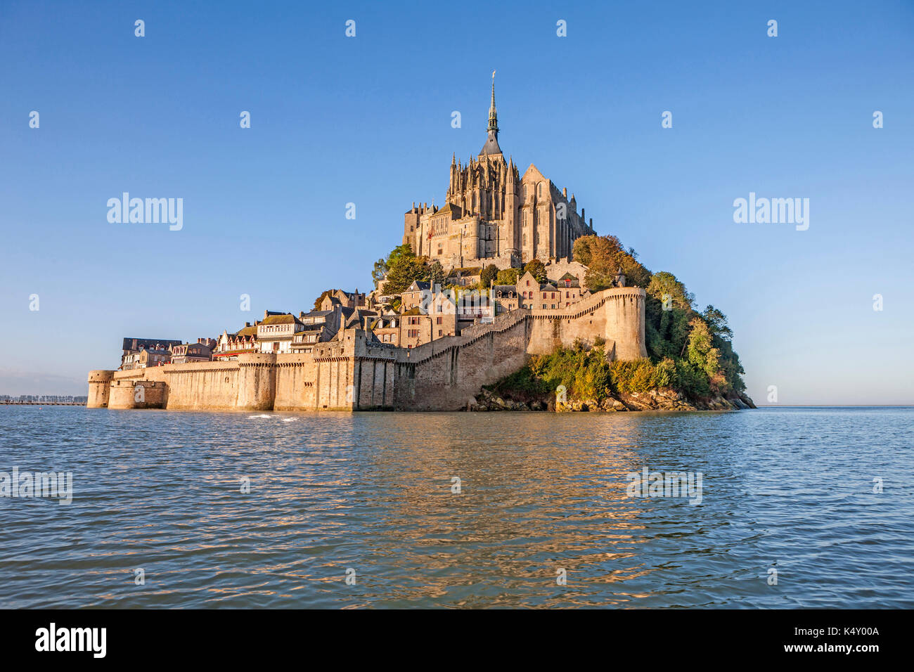 Mont Saint-Michel (Saint Michael's Mount), Normandy, north-western France: Le Mont Saint-Michel viewed from the sea during a spring tide, autumnal equ Stock Photo