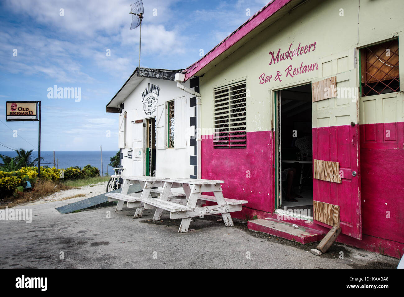 Colourful local pub and rum shop near Martin's Bay on the east coast of Barbados Stock Photo