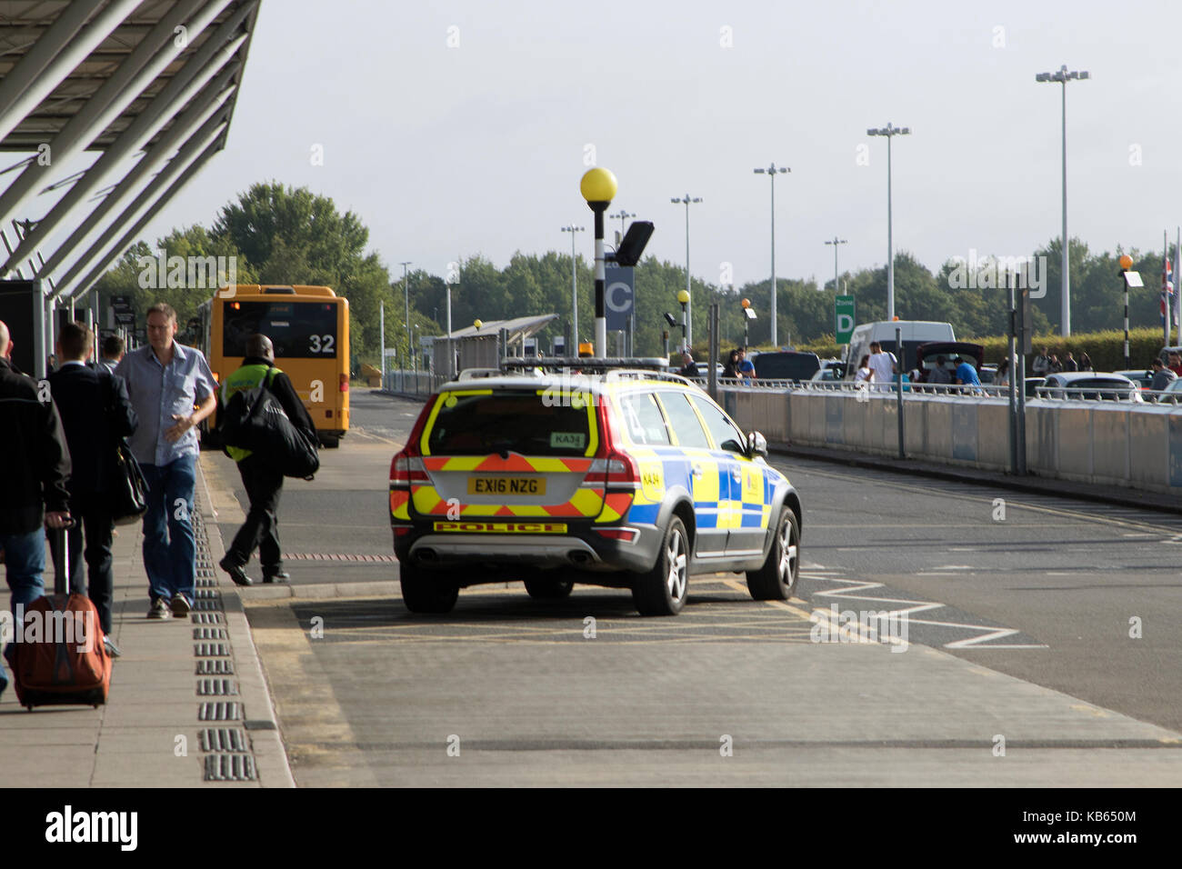 An Essex Police Volvo XC70 armed response vehicle (EX16 NZG) parked outside the terminal at Stansted Airport, Stansted Mountfitchet, Essex, England Stock Photo