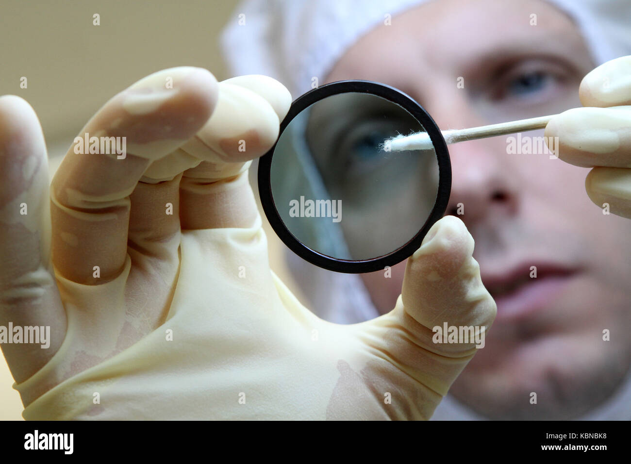 Scientists working in clean room environment Stock Photo