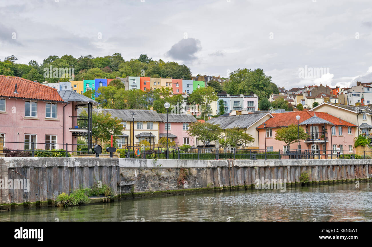 BRISTOL ENGLAND CITY CENTRE HARBOURSIDE HOTWELLS RIVER AVON COLOURED HOUSES ALONGSIDE THE HARBOUR AND ON THE HILL Stock Photo