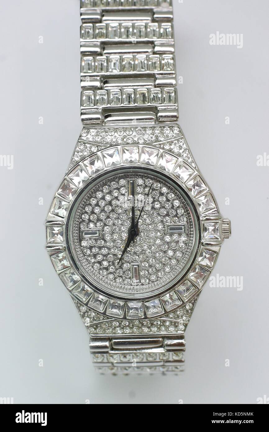 Watch encrusted with fake gold and diamonds, bling jewellery,jewellry, Stock Photo