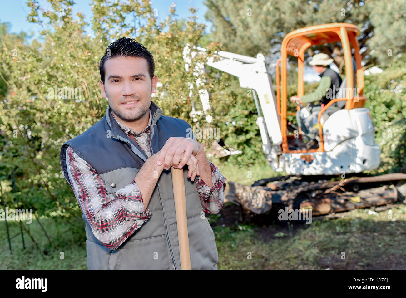 Gardening team getting stuck in Stock Photo