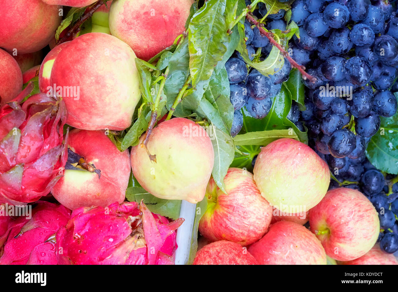 Fresh ripe and sweet fruits on local market, selective focus. Stock Photo