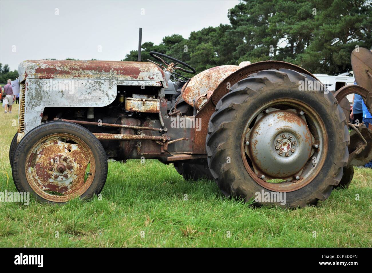 Weather worn  grey fergie tractor Stock Photo