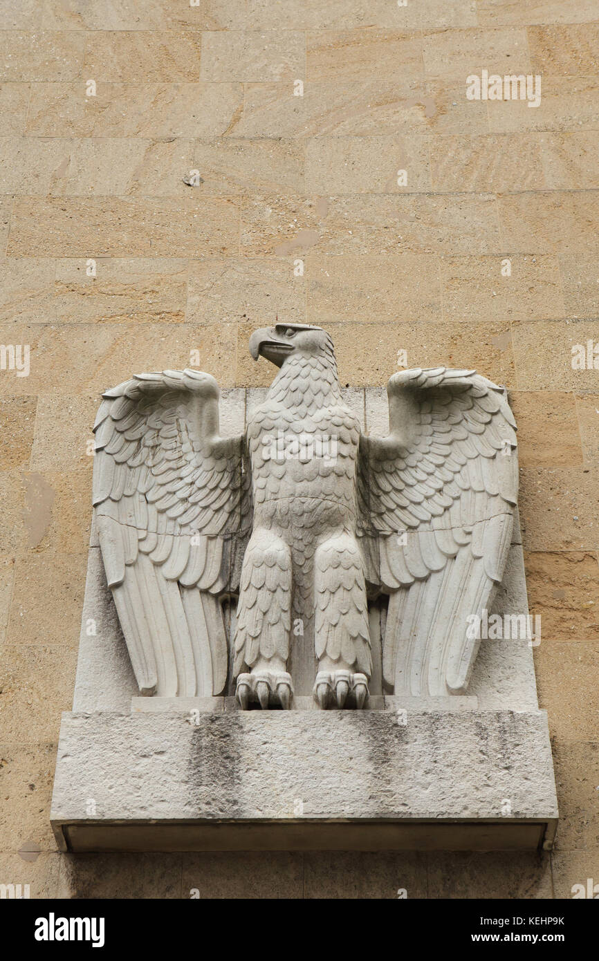 Reichsadler. Nazi eagle from the 1930s on the main building of the Tempelhof Airport in Berlin, Germany. Stock Photo