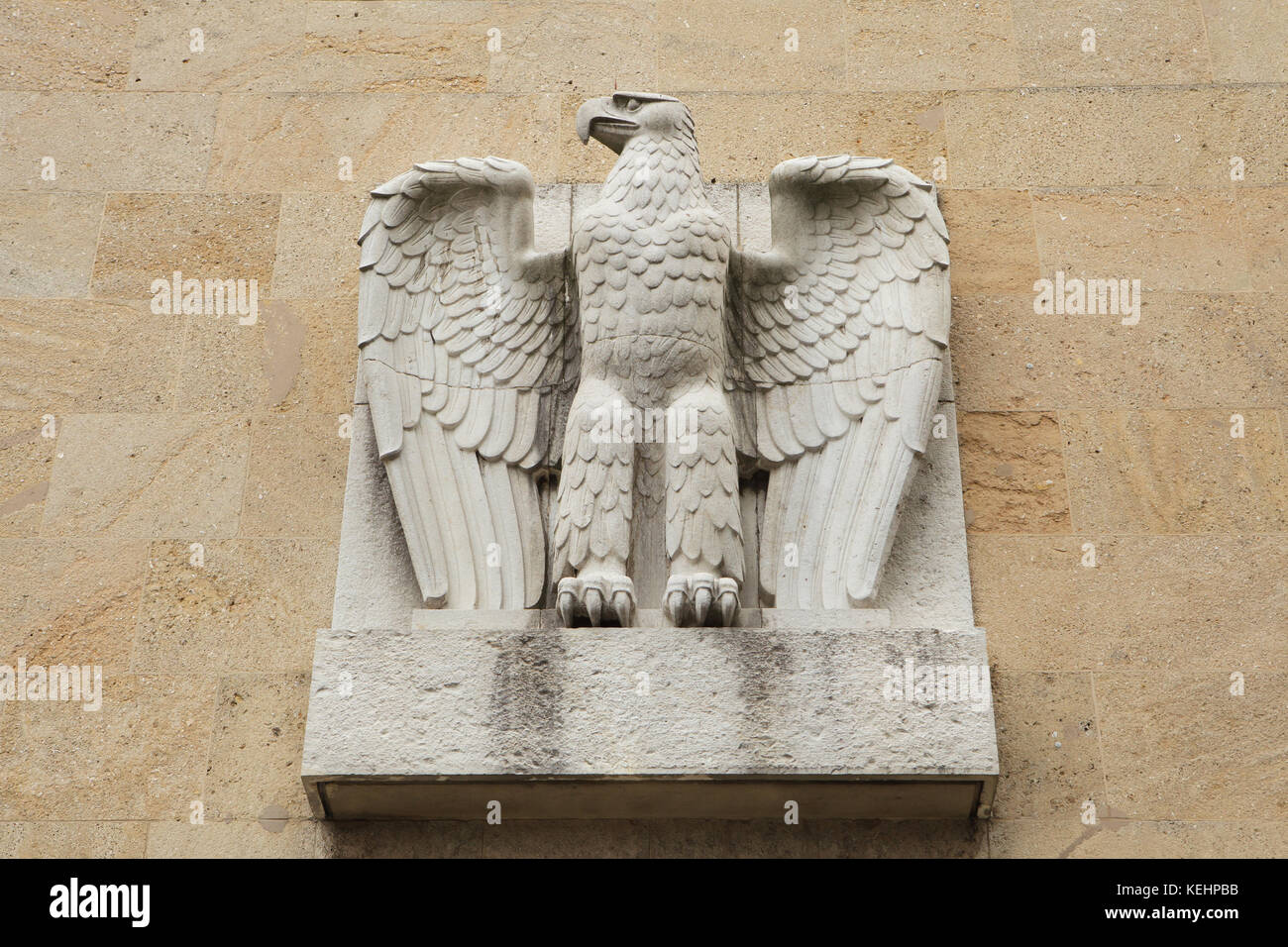 Reichsadler. Nazi eagle from the 1930s on the main building of the Tempelhof Airport in Berlin, Germany. Stock Photo