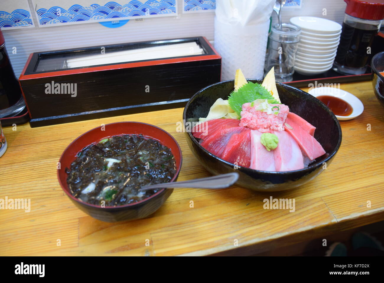 Bowls of japanese sashimi in a restaurant in Tsukiju market, Tokyo - Japan Stock Photo