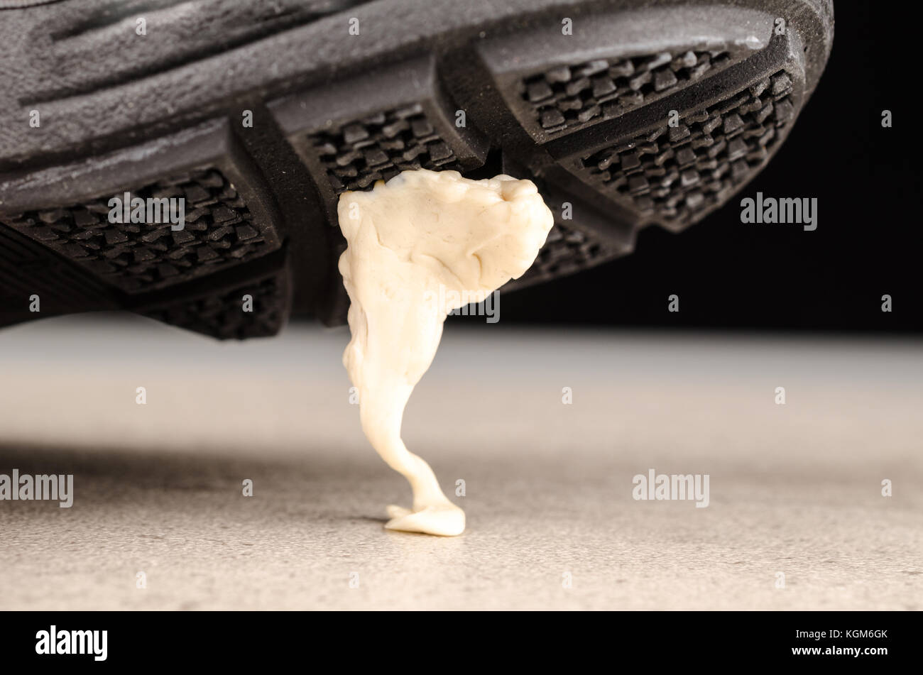 Chewing gum stuck to a shoe sole, a concept Stock Photo