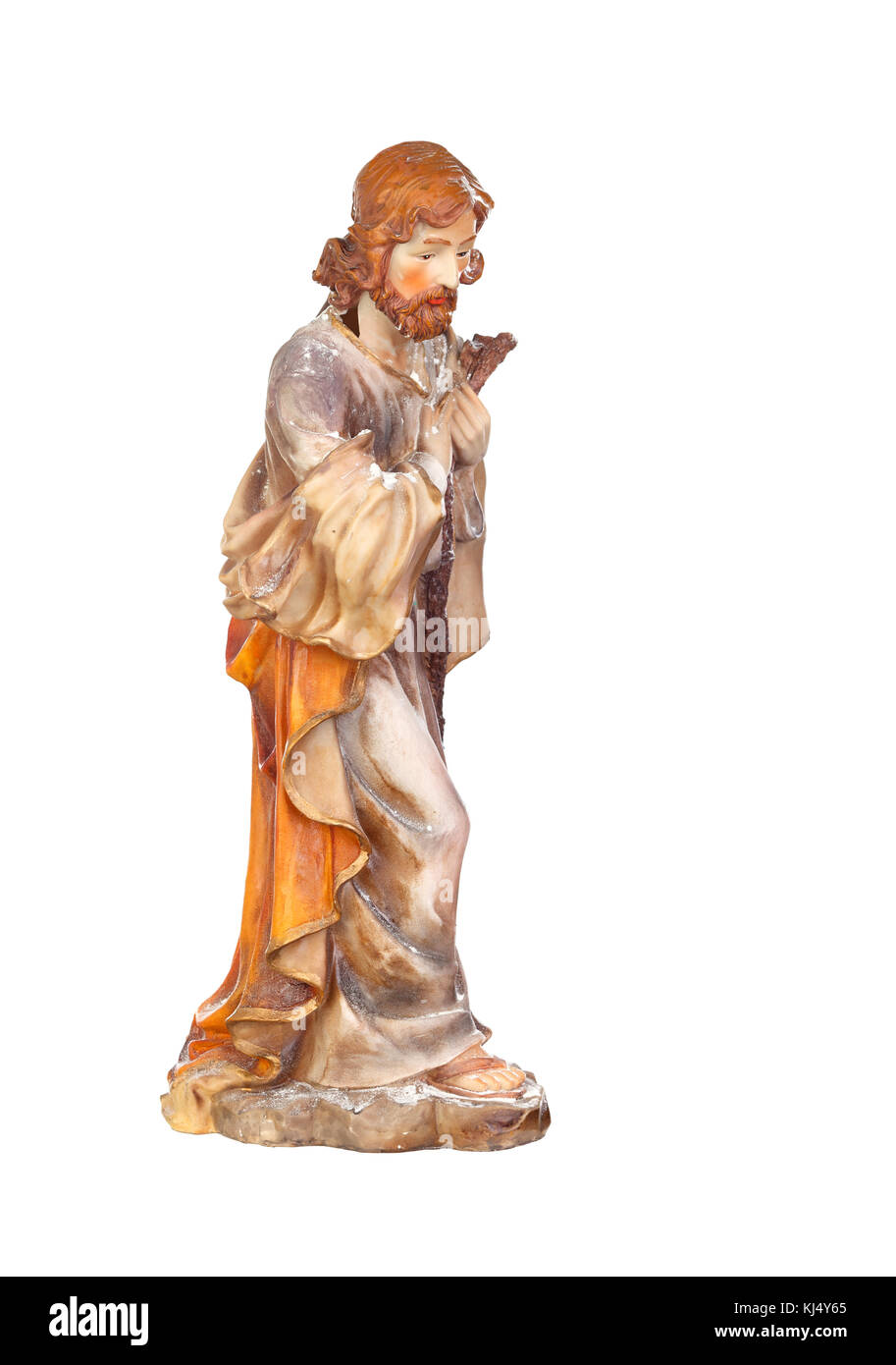 Figure of Saint Joseph of the Nativity scene isoalted on a white background Stock Photo