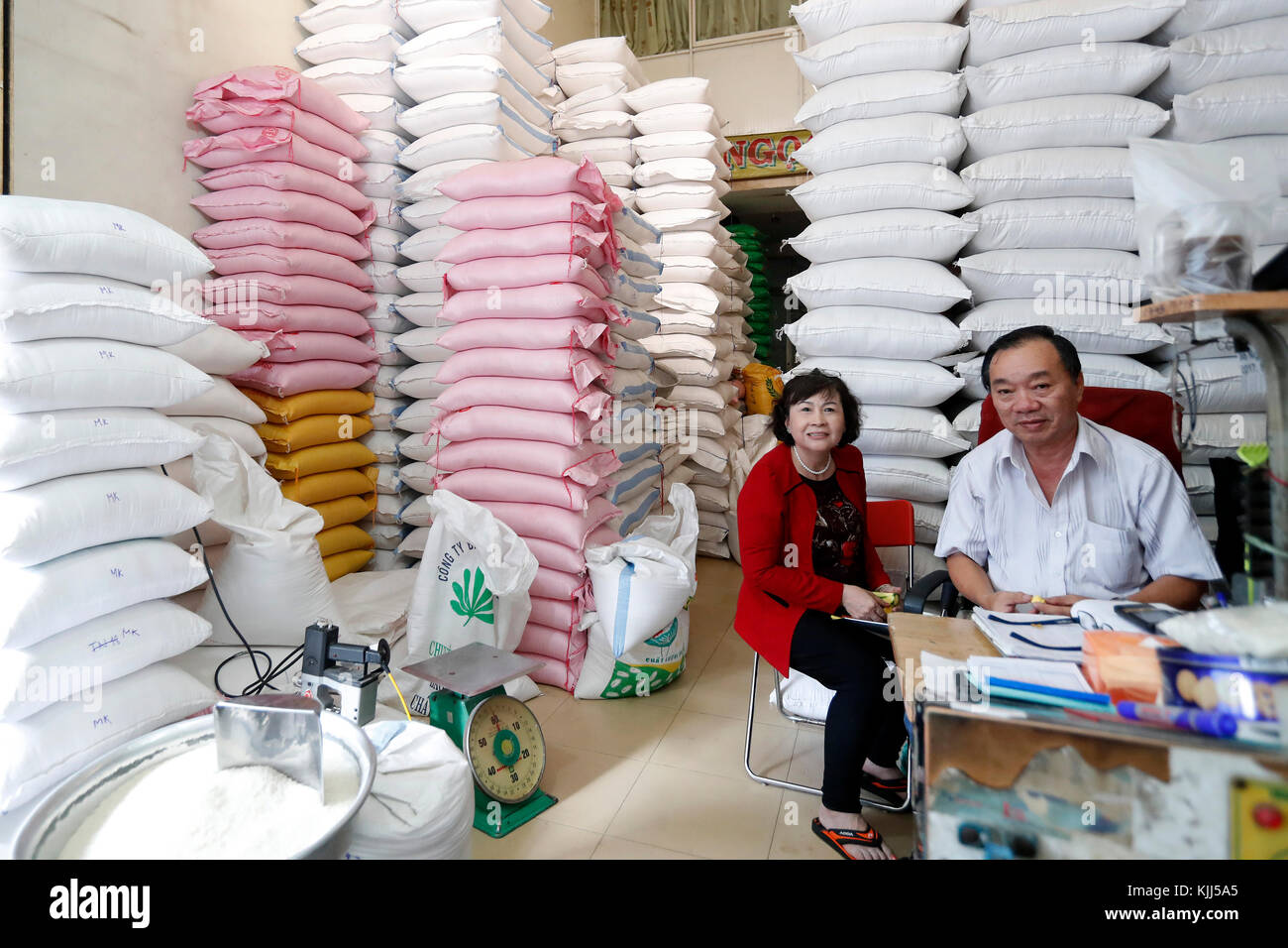 Rice bags for sale at local market.  Ho Chi Minh City. Vietnam. Stock Photo