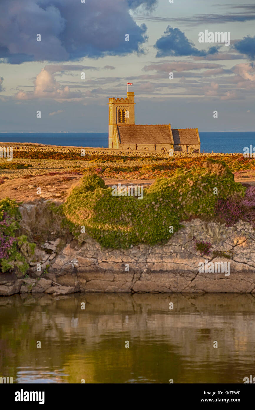 St Helena's Church and Rocket Pole Pond on Lundy Island, Devon, England UK in August - St Helens Church - hdr effect Stock Photo