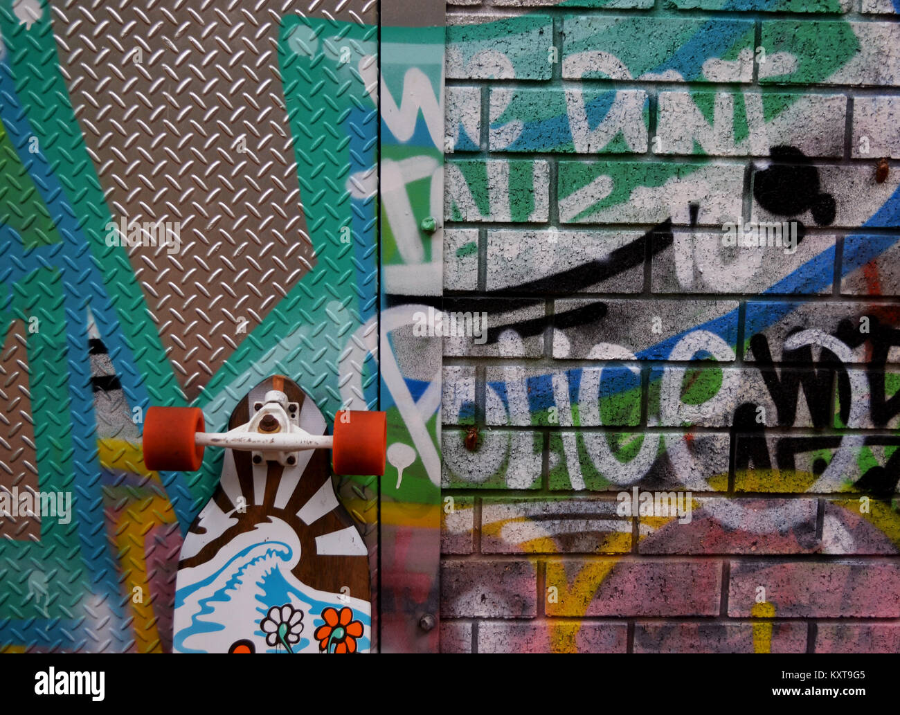 Gang culture spray painting and skateboard with words We don't talk to Police showing anti-police attitude Stock Photo