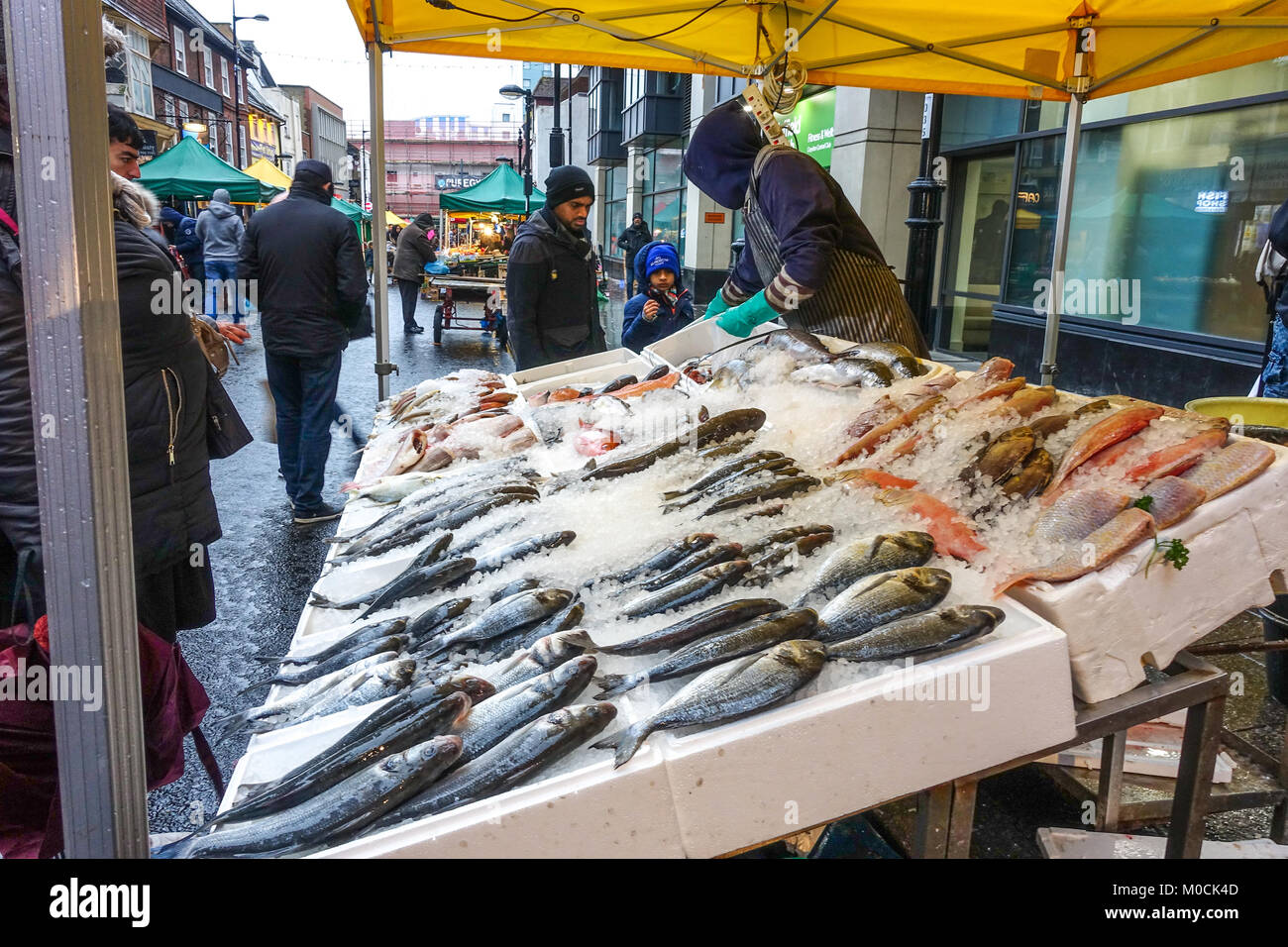 A fresh fish stall in Surrey Street market in Croydon, South London. Stock Photo