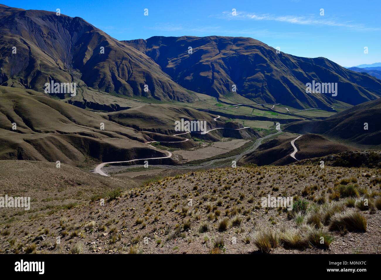 Curving gravel road to the Cuesta del Obispo,Los Cardones National Park,Ruta RP 33,Salta Province,Argentina Stock Photo