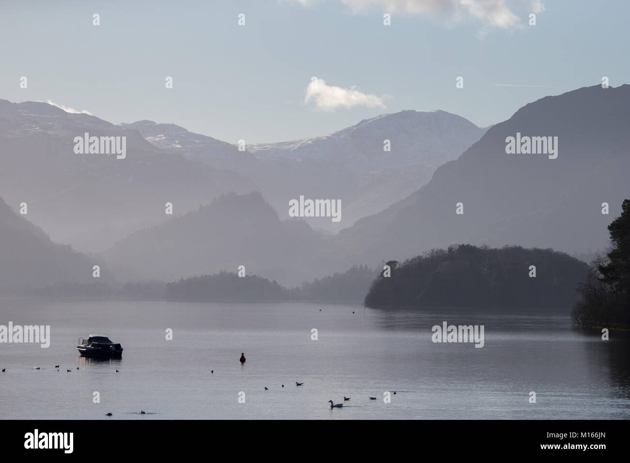 Derwent Water near Keswick, in the English Lake District National Park on a misty/hazy winters day Stock Photo