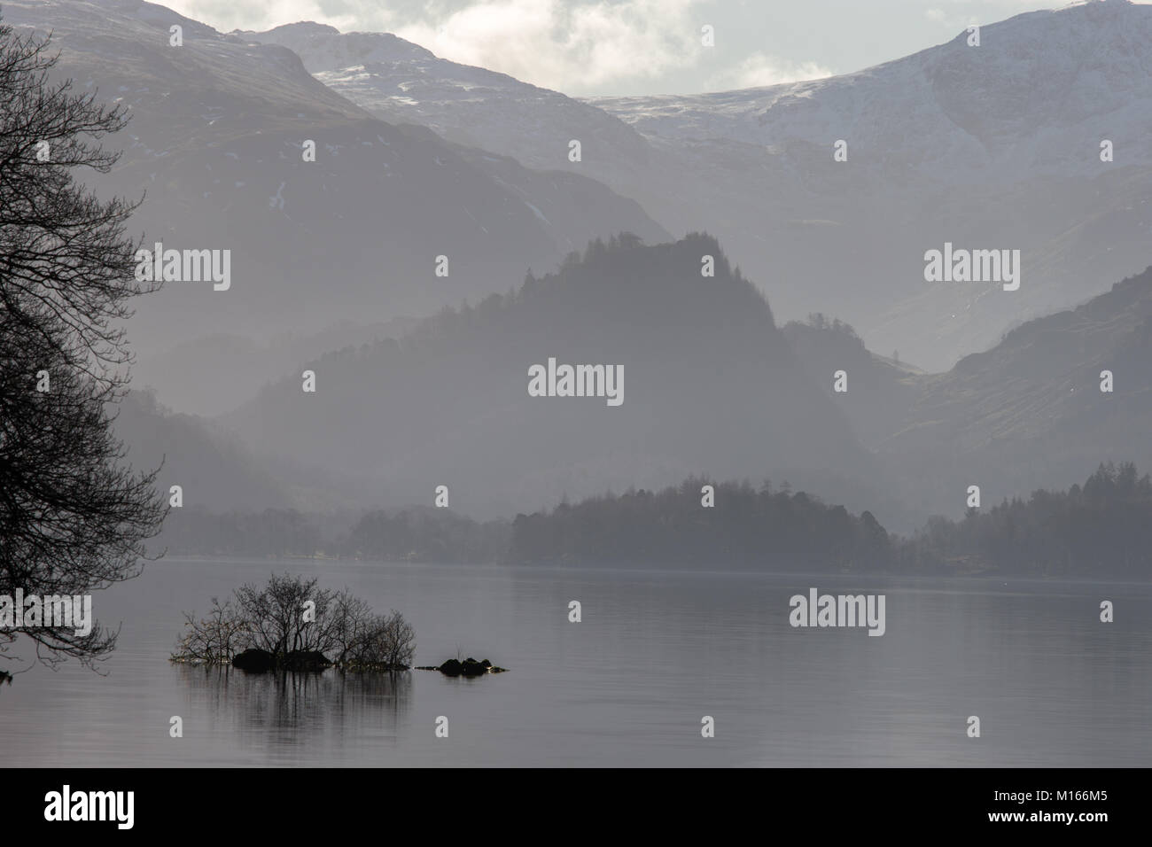 Derwent Water near Keswick, in the English Lake District National Park on a misty/hazy winters day Stock Photo