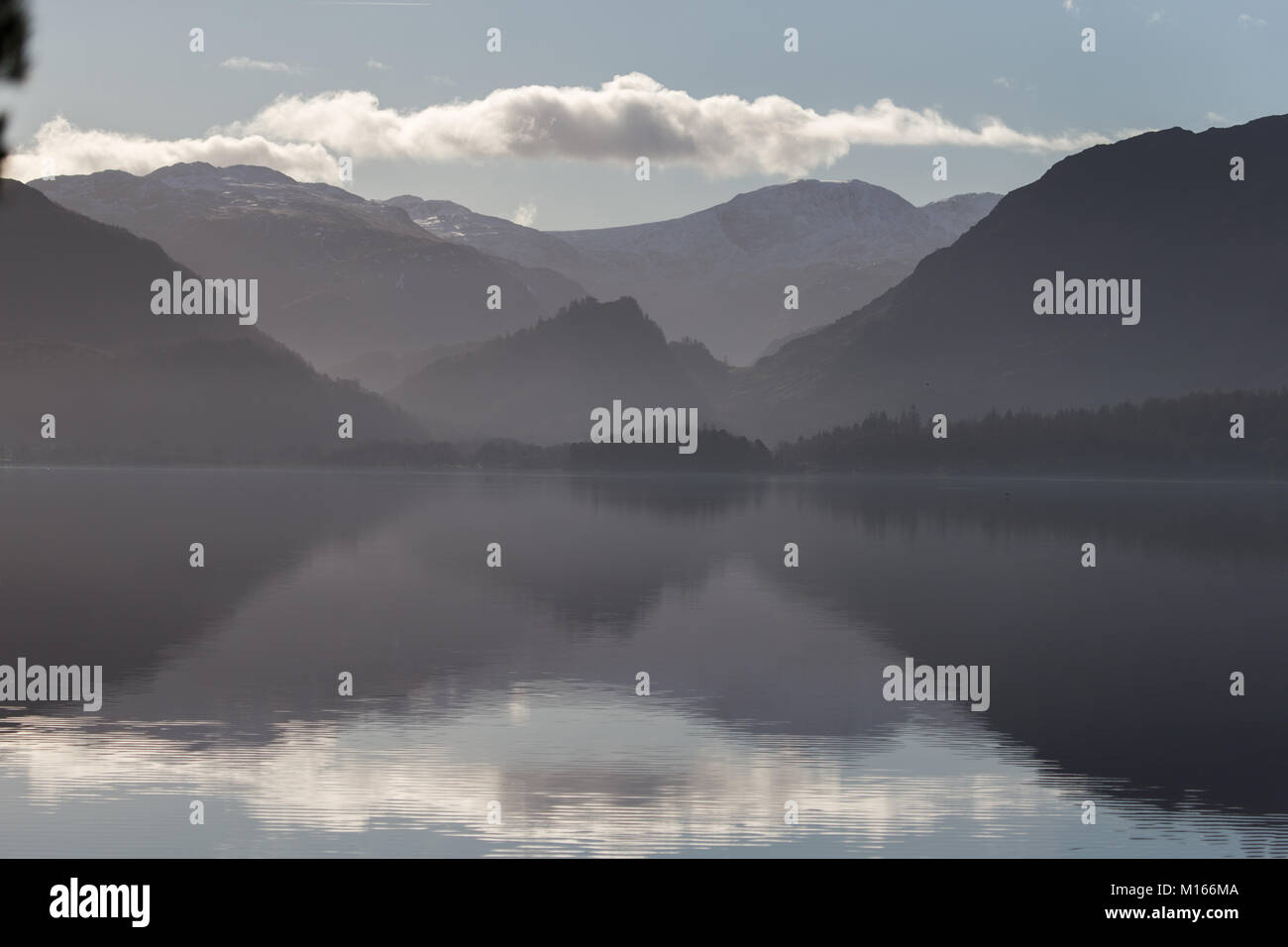 Derwent Water near Keswick, in the English Lake District National Park on a misty/hazy winters day Stock Photo