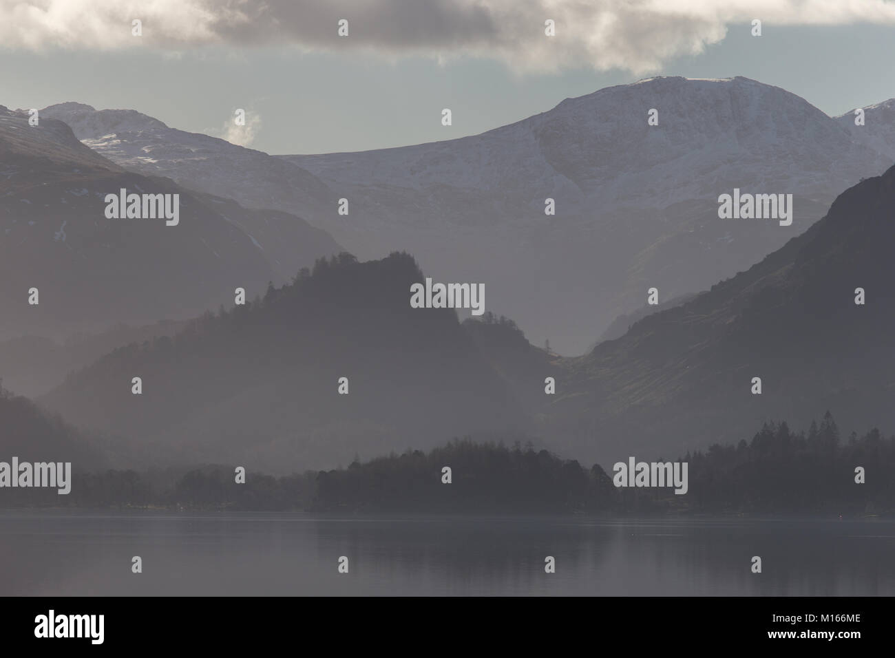 Derwent Water near Keswick, in the English Lake District National Park on a misty/hazy winters day Stock Photo