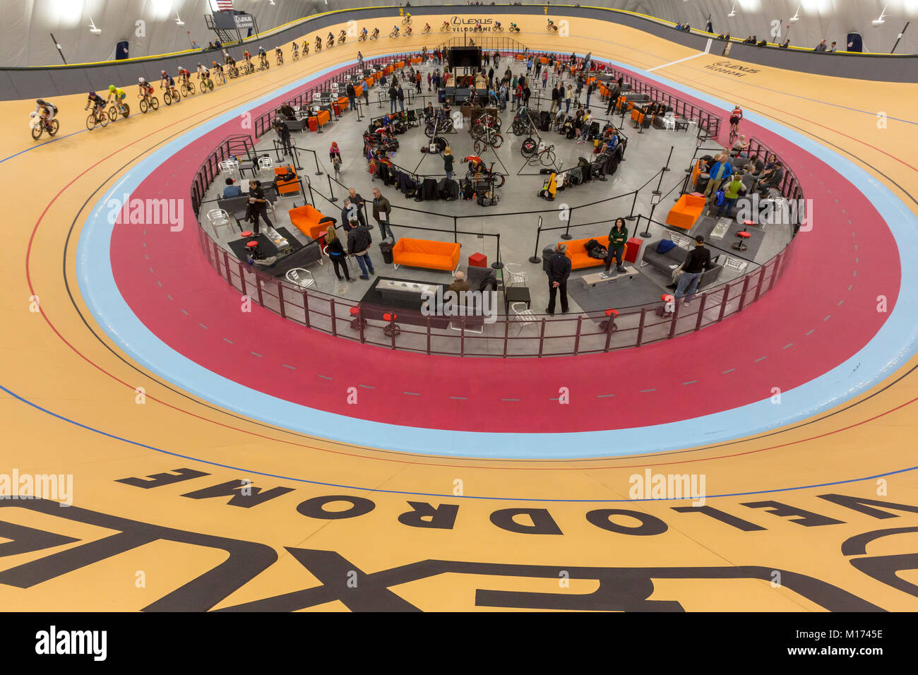 Detroit, Michigan USA - 26 January 2018 - A series of bicycle races celebrated the grand opening of the Lexus Velodrome, one of only three indoor veleromes in the United States. Cyclists warmed up on the track before racing began. Credit: Jim West/Alamy Live News Stock Photo