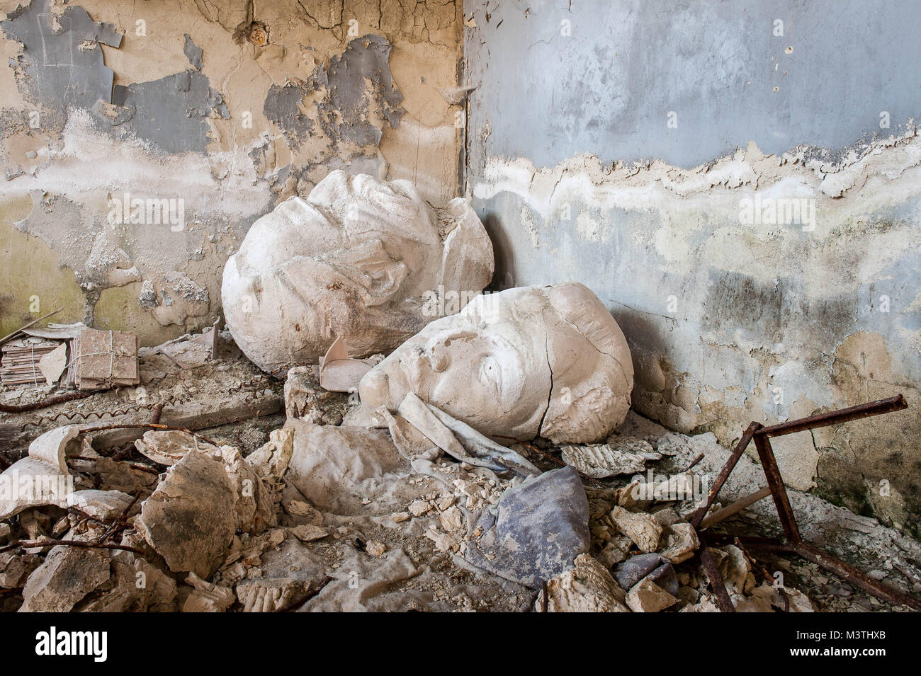 A casted head of loathed General Secretary Stalin in the corner of an abondoned swimmingpool in Dzhermuk. Stock Photo