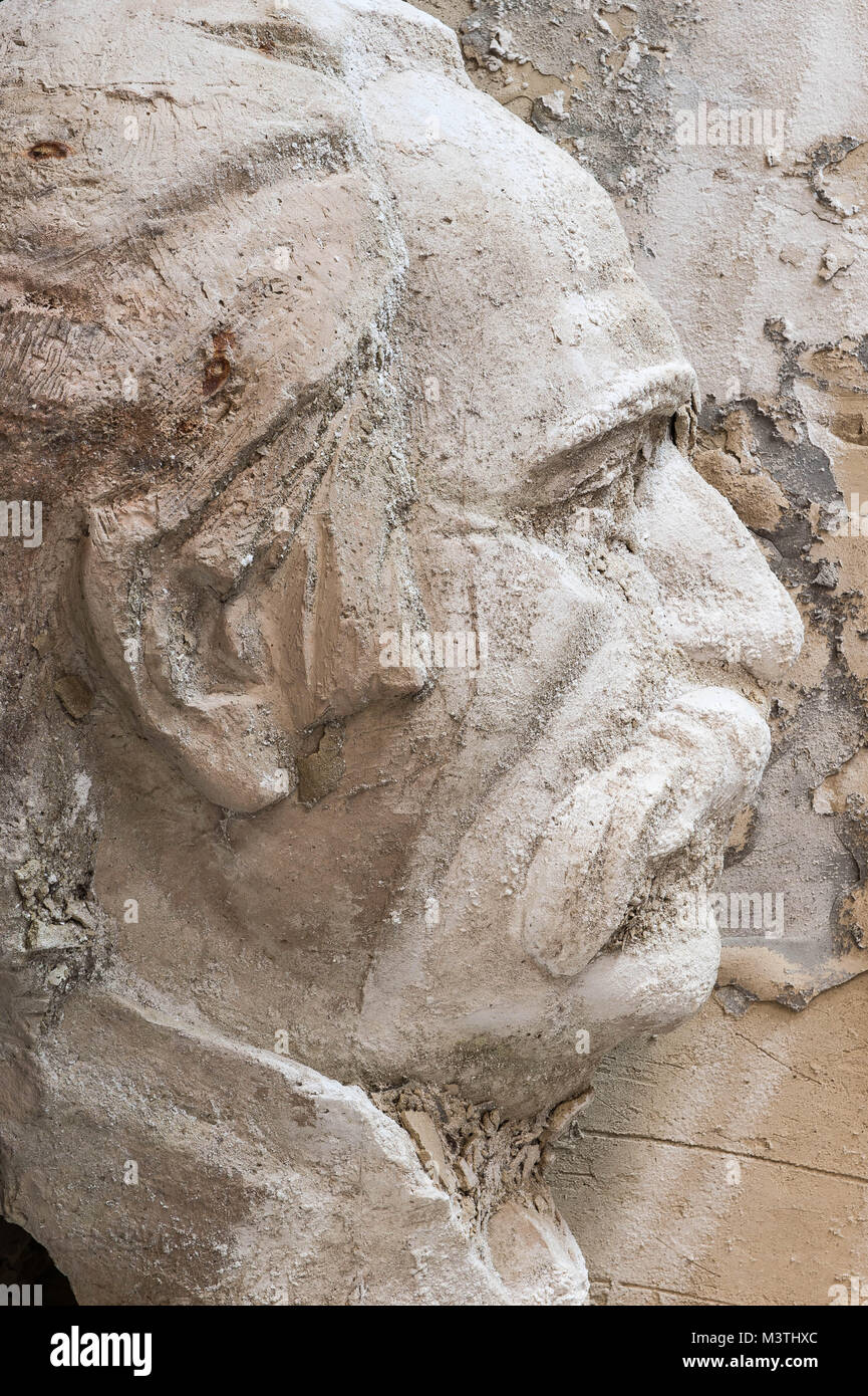 A casted head of loathed General Secretary Stalin in the corner of an abondoned swimmingpool in Dzhermuk. Stock Photo