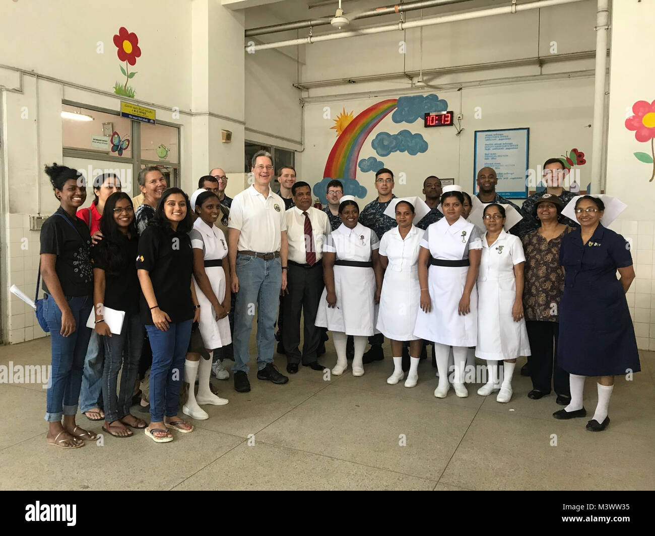 171029-N-OU681-0002 COLOMBO, Sri Lanka (Oct. 29, 2017) Sailors from Nimitz Carrier Strike Group (CSG) and representatives from the U.S. Embassy in Sri Lanka gather before a volunteer event at Lady Ridgeway Hospital in Colombo, Sri Lanka. The group did crafts and spoke with children during the visit. Nimitz CSG is on a regularly scheduled deployment in the 7th Fleet area of responsibility in support of maritime security operations and theater security cooperation efforts. (U.S. Navy photo by Lt. j.g. Michelle Tucker/Released) 171029-N-OU681-0002 by Naval Base Kitsap (NBK) Stock Photo