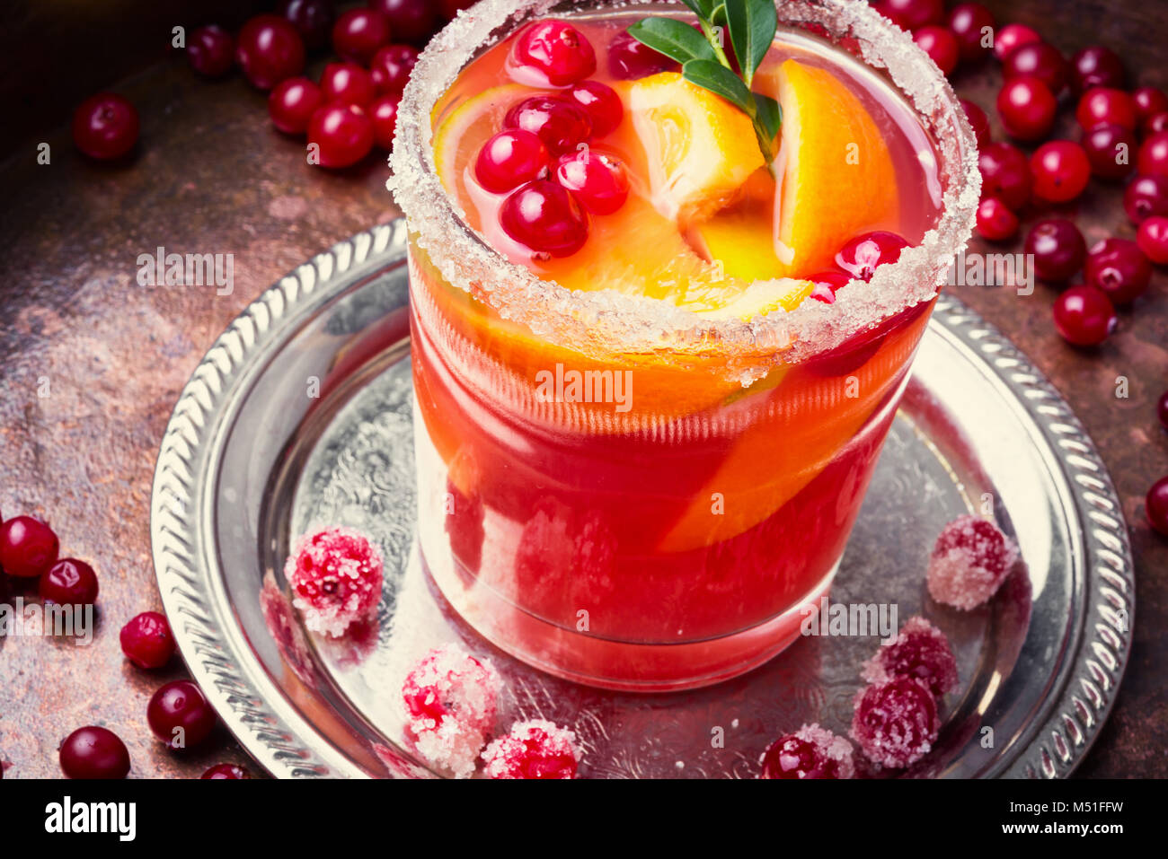 Sangria with orange,mint and berries in a glass goblet Stock Photo