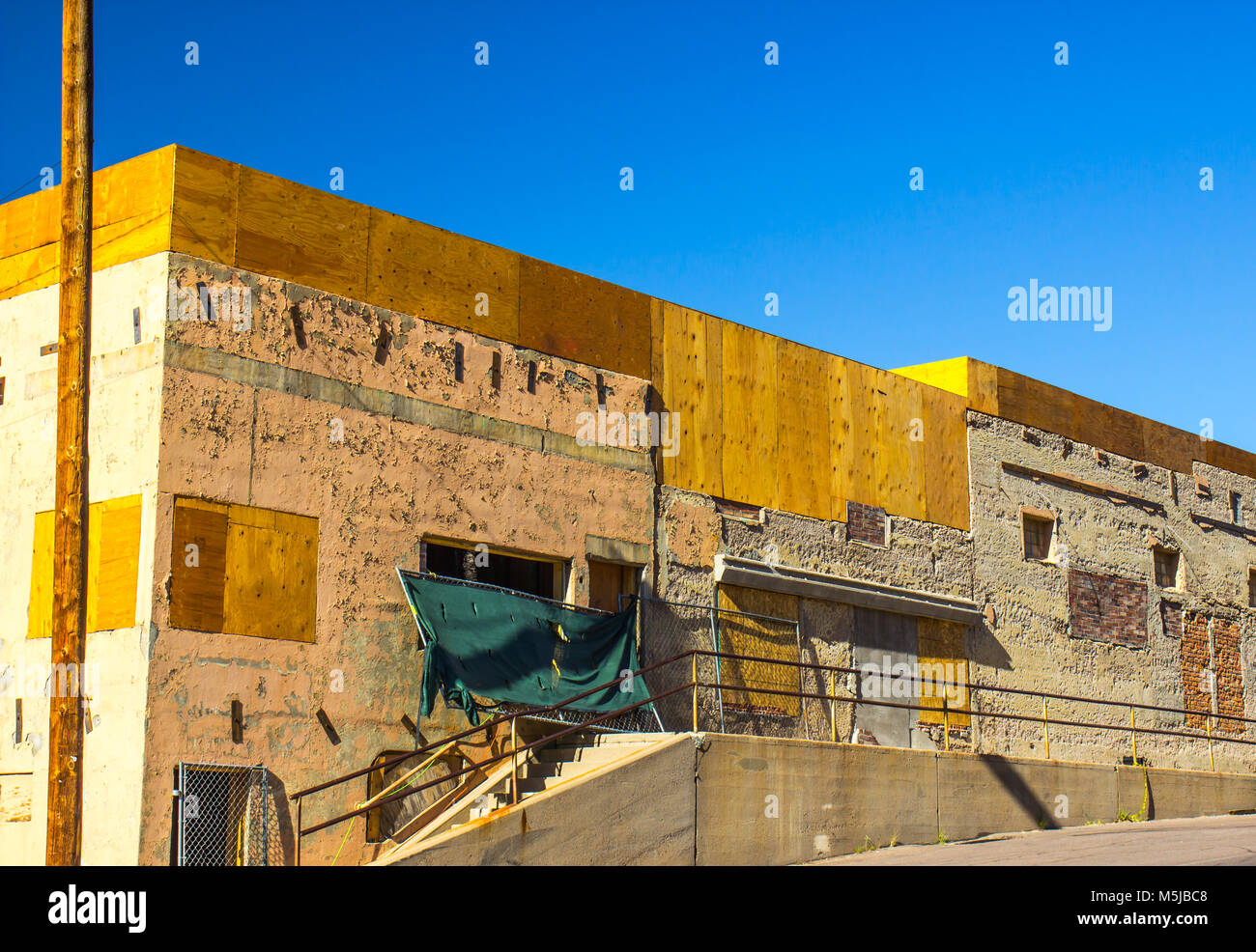 Vintage Building With Boarded Up Windows Stock Photo