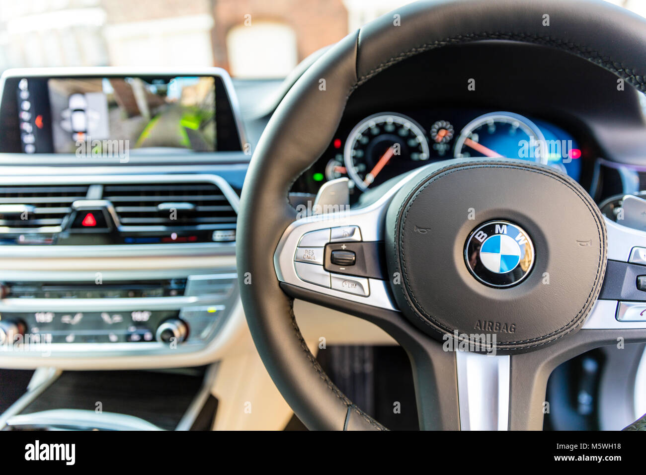 Inside new BMW 7series car, BMW 7series car interior, BMW 7series car dashboard, BMW 7series car steering wheel, New BMW 7series car interior, UK cars Stock Photo