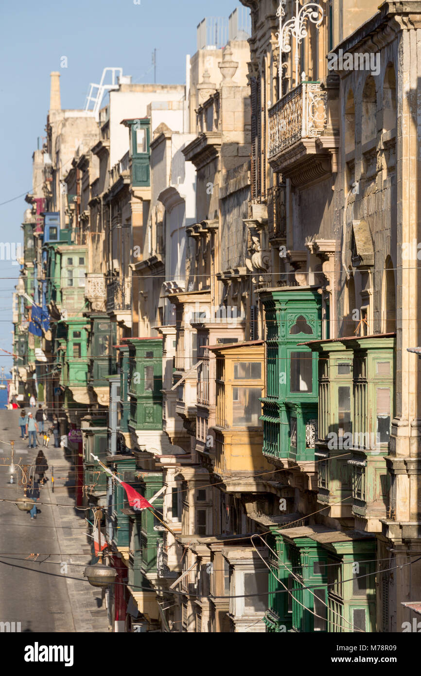 Traditional balconies on the Triq Ir Repubblika street in old town Valletta, UNESCO and European Capital of Culture 2018, Valletta, Malta Stock Photo