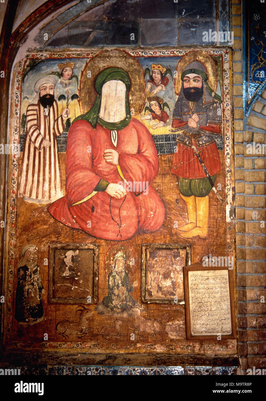 Harun-i Vilayat Shrine. Room precedint inner tomb chamber in mausoleum. Wall painting. Iman Hassan and Hussain with the Holy Prophet in the centre (veiled face). Isfahan. Islamic Republic of Iran. Stock Photo