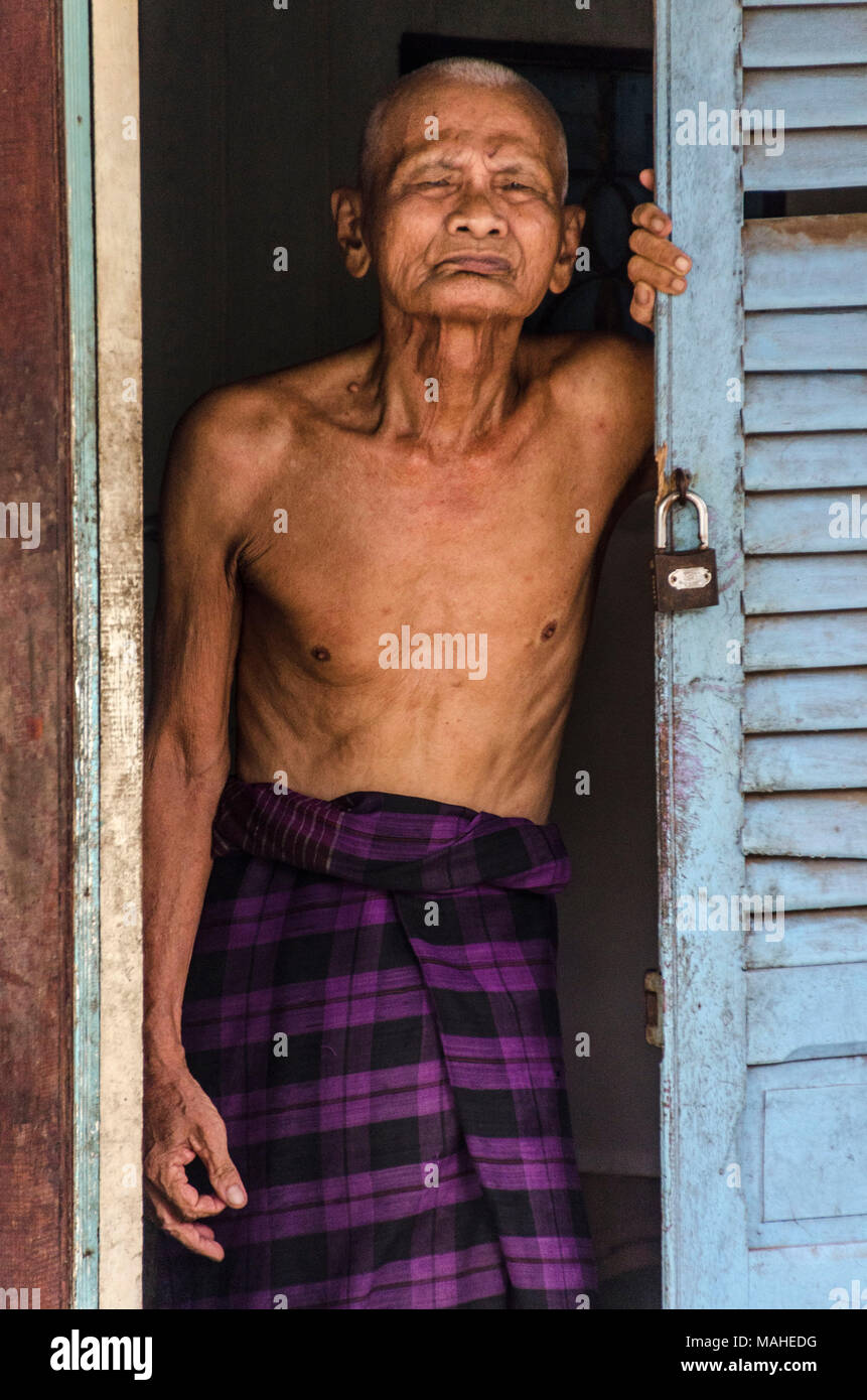 An old man of the Cham ethnic group in Chau Doc, Vietnam Stock Photo