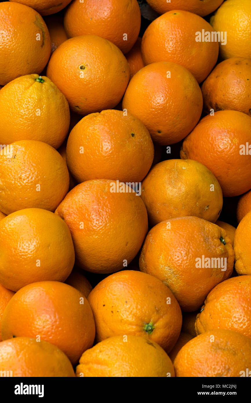 Piles of Seville oranges in a Spanish greengrocer in Madrid, Spain Stock Photo