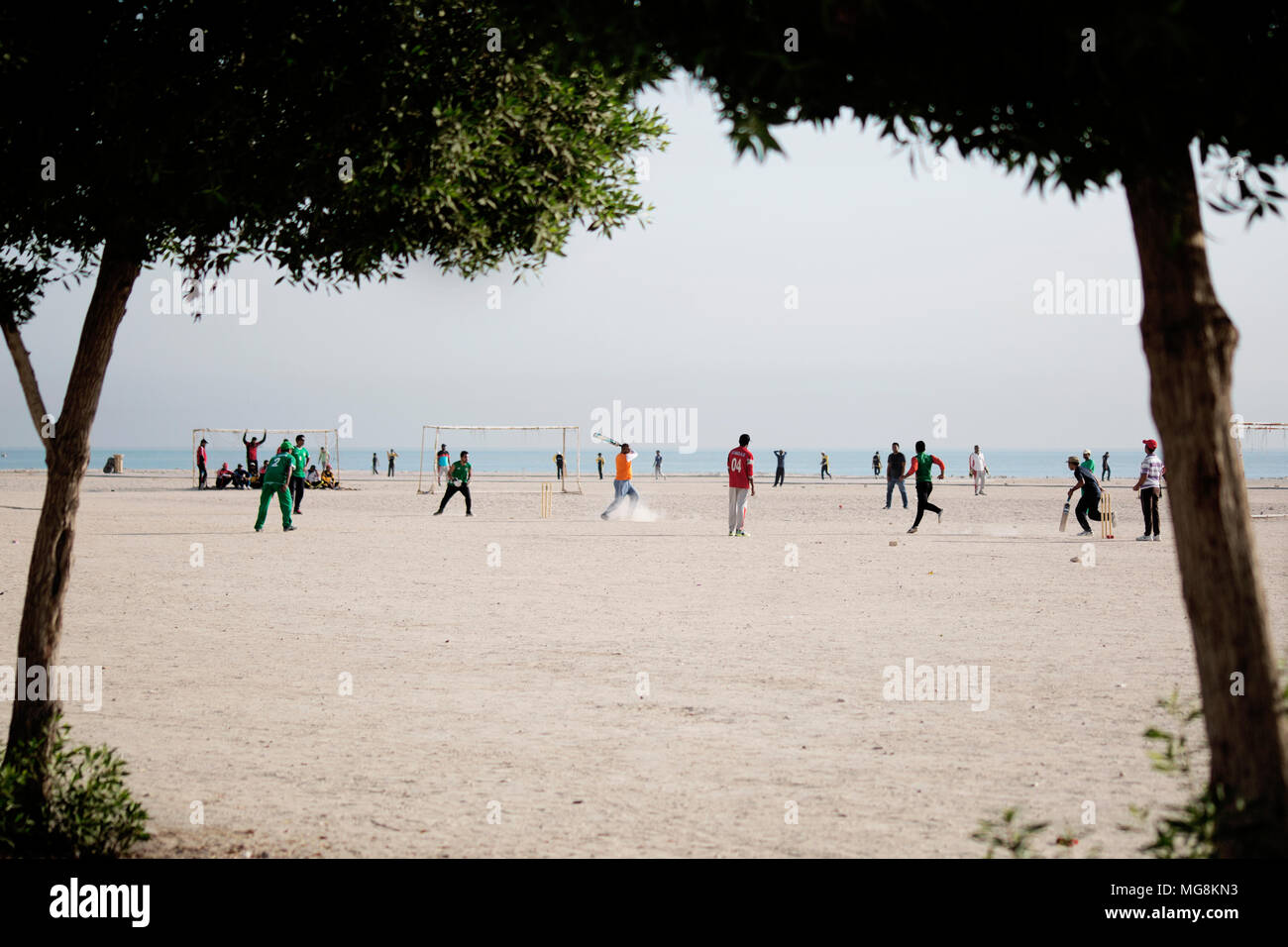 Beach cricket on the weekend Stock Photo