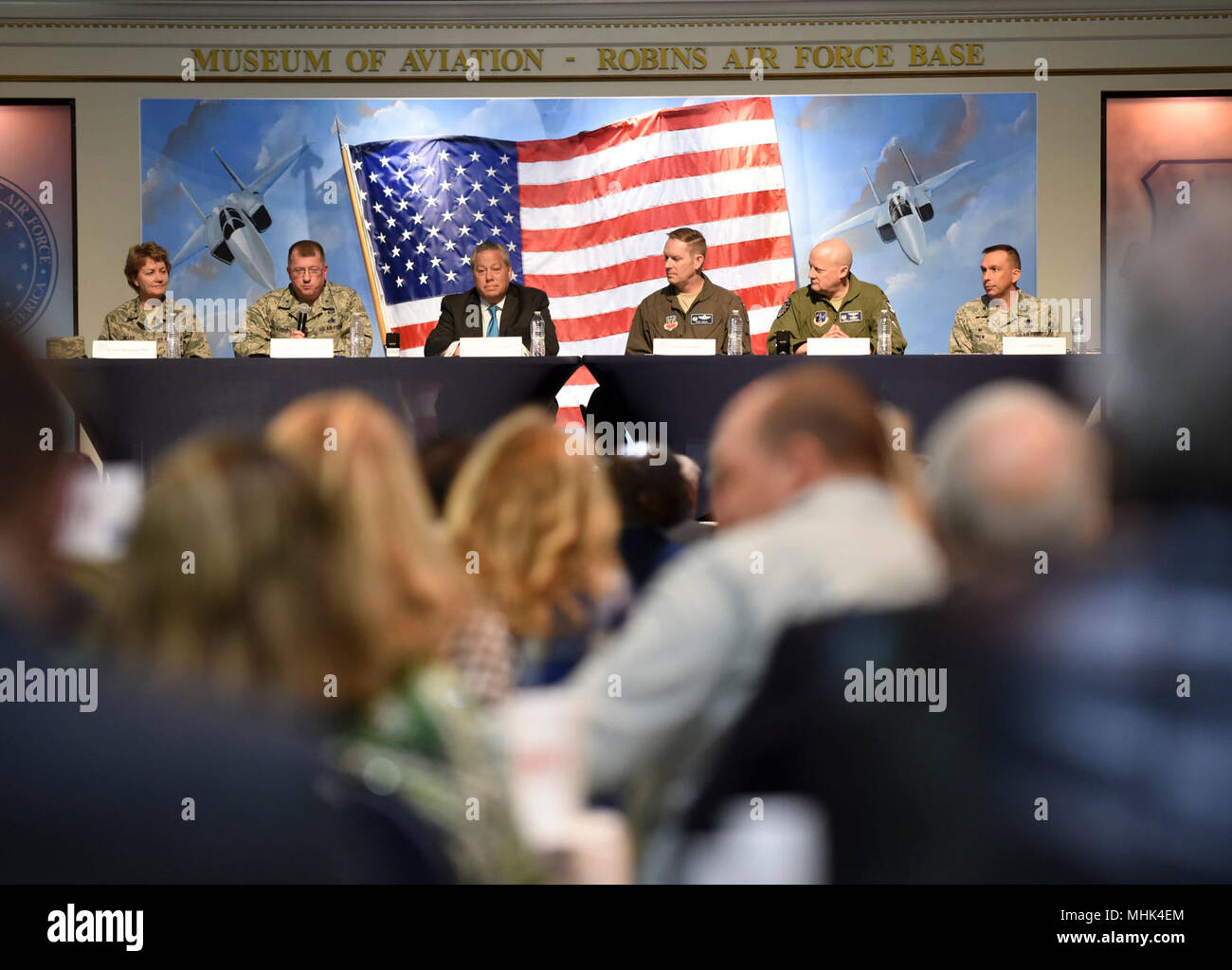 The State of the Base was held March 14, 2018 at the Museum of Aviation Century of Flight Hangar. Panelists included: Lt. Gen. Maryanne Miller, Headquarters Air Force Reserve Command commander; Brig. Gen. John Kubinec, Warner Robins Air Logistics Complex commander; Tom Fischer, director of engineering, Operating Location - Robins, Air Force Sustainment Center; Col. Curtis Bass, 461st Air Control Wing commander; Col Tom Grabowski, 116th Air Control Wing commander; and Col. Lyle Drew, 78th Air Base Wing commander. (U.S. Air Force Stock Photo