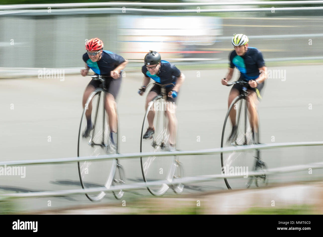 London, UK. 13th May, 2018. Members of the Penny Farthing cycling club perform track racing at Herne Hill velodrome. Tom Leefe, Richard Thoday and Joff Summerfield race their cycles. Credit: Guy Corbishley/Alamy Live News Stock Photo