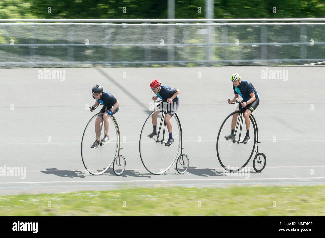 London, UK. 13th May, 2018. Members of the Penny Farthing cycling club perform track racing at Herne Hill velodrome. Tom Leefe, Richard Thoday and Joff Summerfield race their cycles. Credit: Guy Corbishley/Alamy Live News Stock Photo