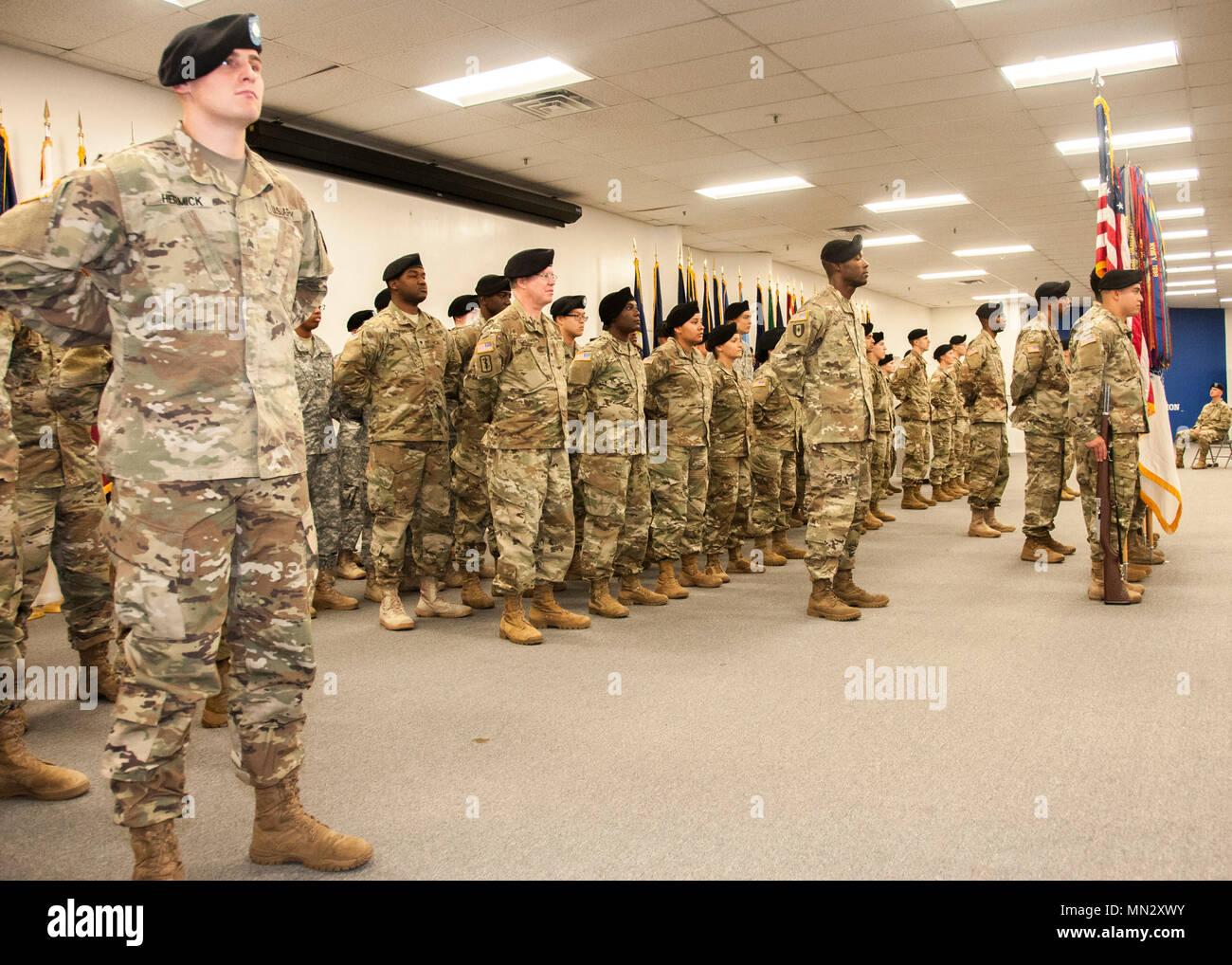 Soldiers stand at parade rest during a change of command ceremony where Col. Valerie Holmes relinquished command to Col. Karen Keith at the Fort Bliss and Old Ironsides Museum, Aug. 18. Stock Photo