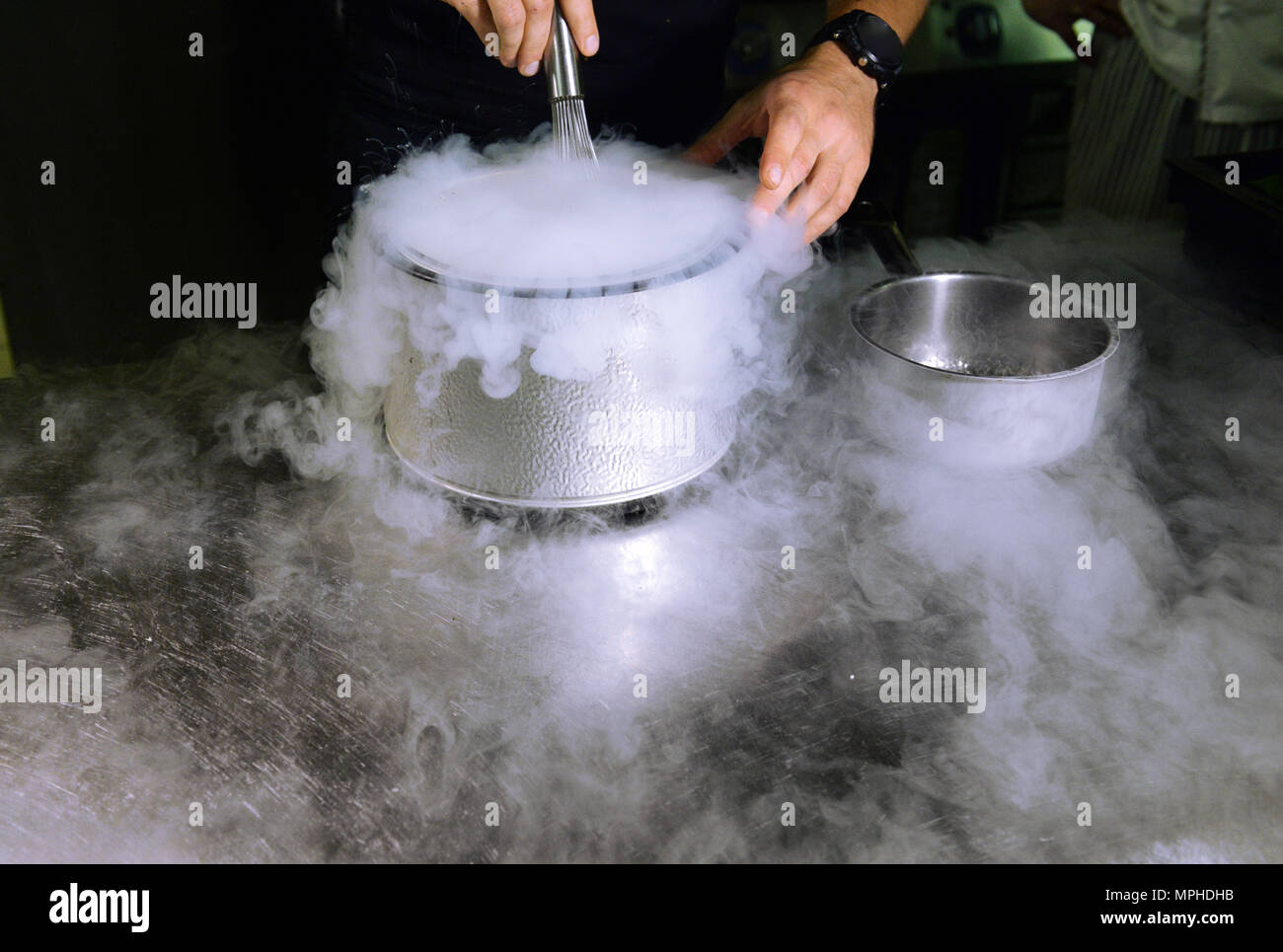 Making ice cream with liquid nitrogen, professional cooking Stock Photo