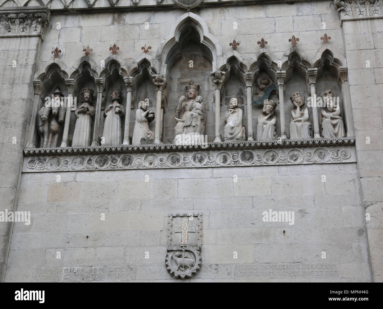 Gemona, UD, Italy - April 1, 2018: statue of Three Kings also calles three biblical Magi on the facade of the ancient Cathedral Stock Photo