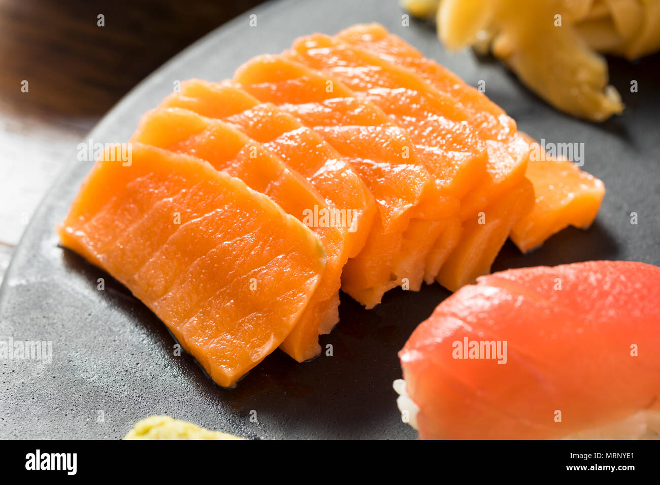 Raw Japanese Salmon Sashimi with Wasabi and Nigiri Stock Photo