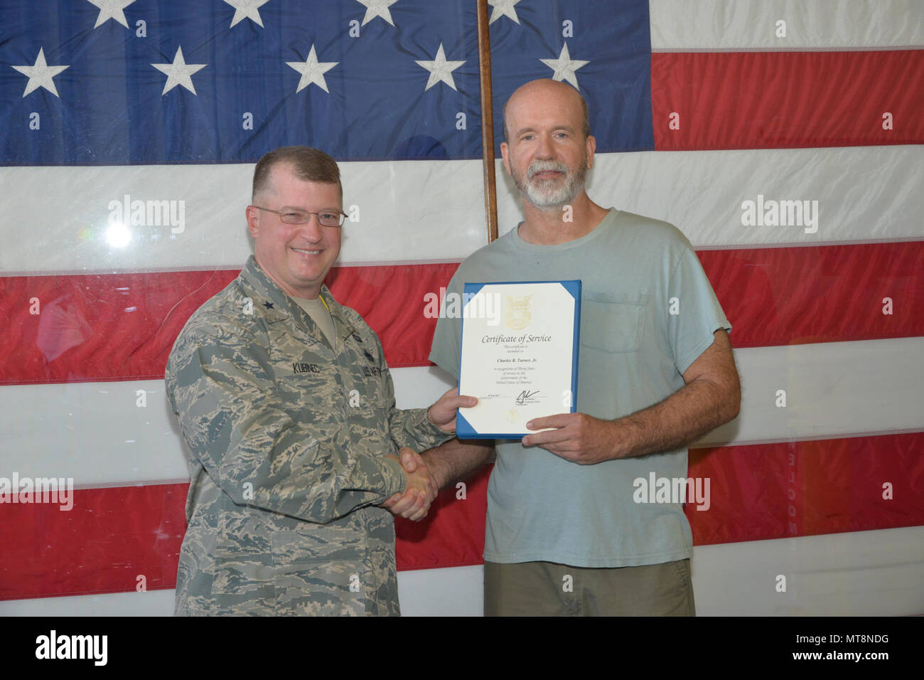 Brig. Gen. John Kubinec, Warner Robins-Air Logistics Complex commander, recently presented first quarter awards and 30-year service pins to WR-ALC military and civilian employees. 30-Year Service Award Recipients -  Charles B. Turner, Jr. – 559th Aircraft Maintenance Squadron. Stock Photo