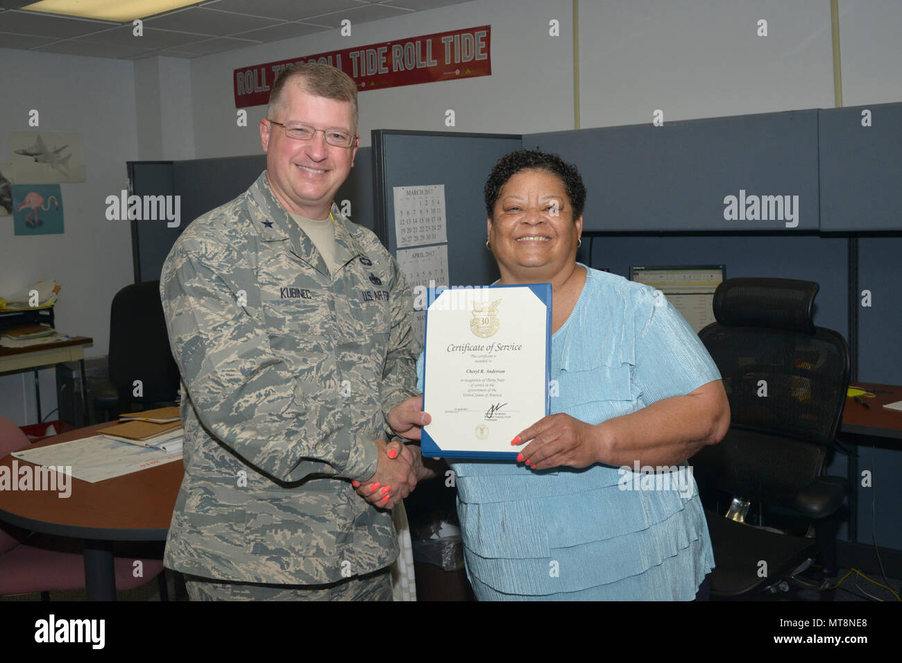 Brig. Gen. John Kubinec, Warner Robins-Air Logistics Complex commander, recently presented first quarter awards and 30-year service pins to WR-ALC military and civilian employees. 30-Year Service Award Recipients - Cheryl R. Anderson – Office of Management & Budget. Stock Photo