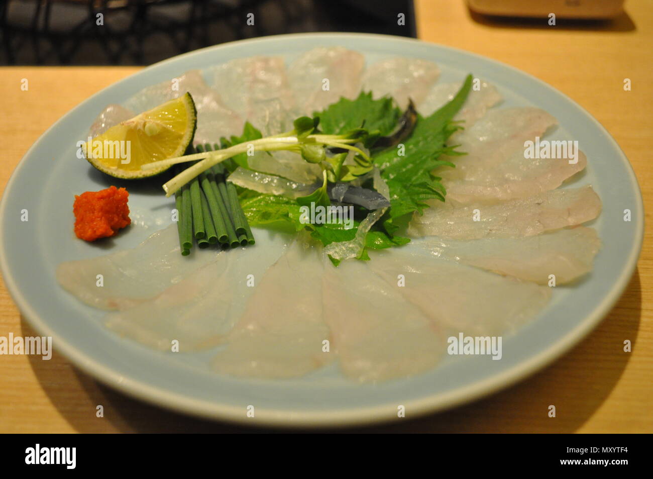 Plate of fugu sashimi, Tokyo, Japan Stock Photo