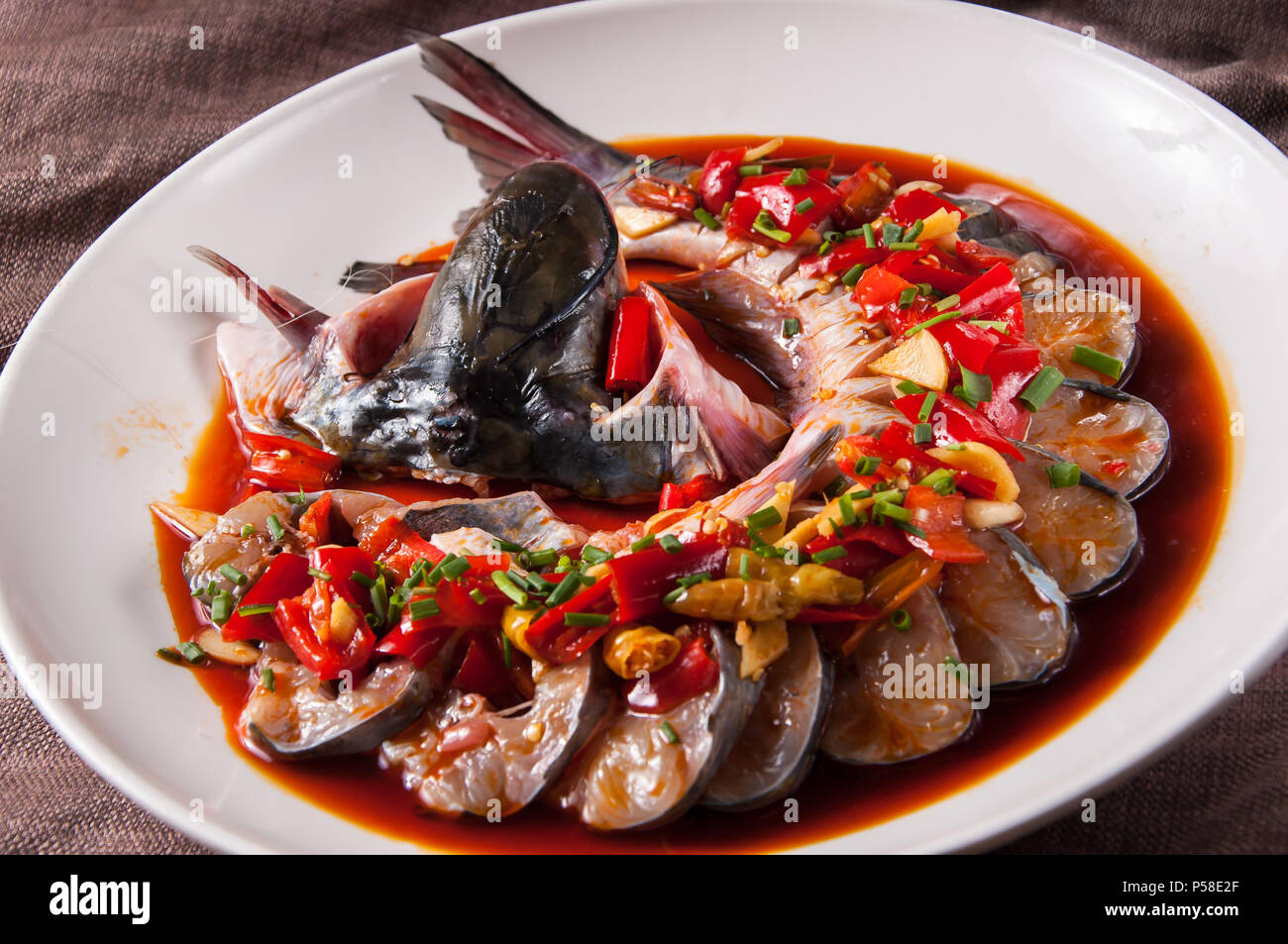 Steamed catfish with pickled peppers Stock Photo