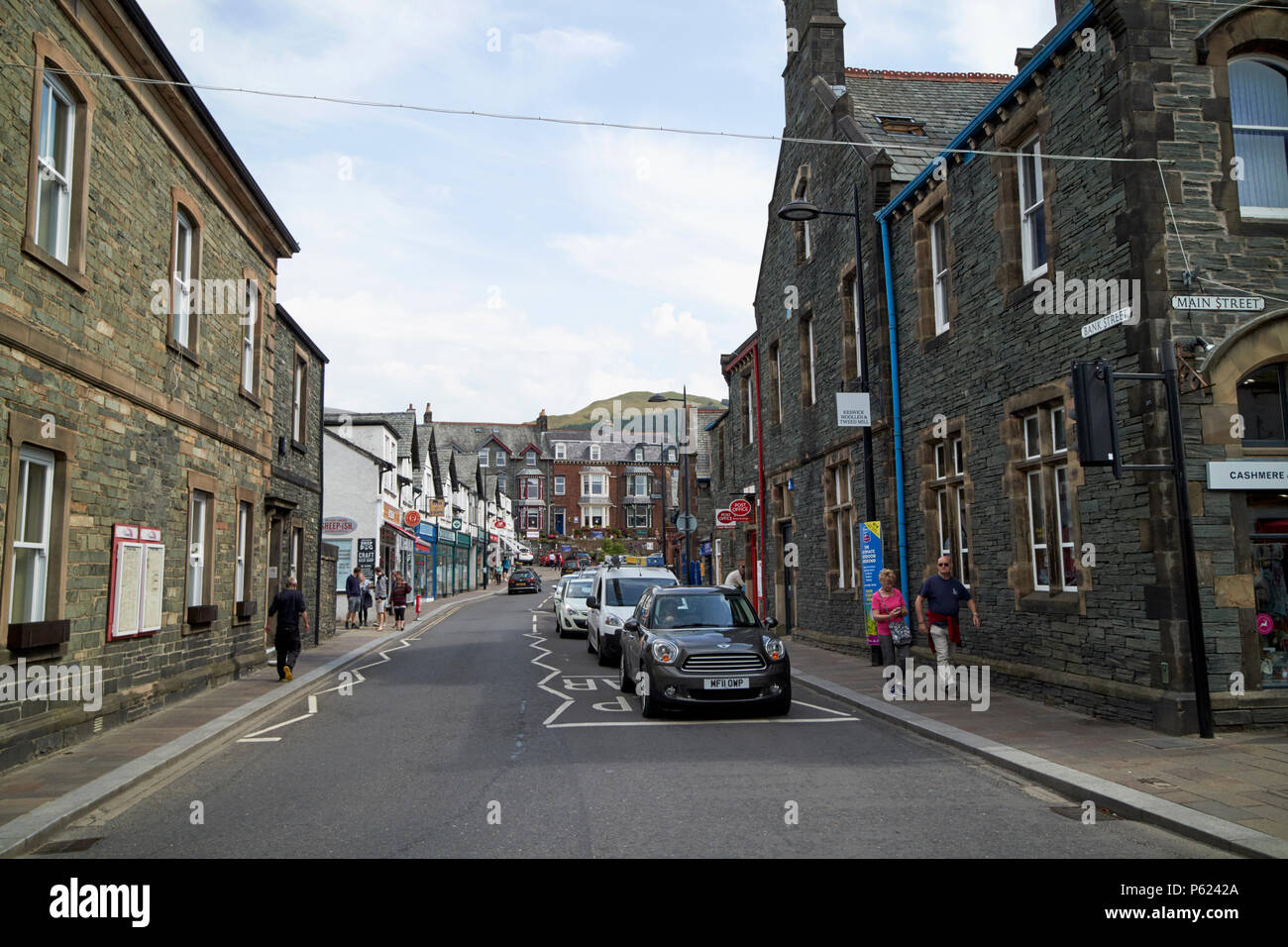 busy bank holiday traffic on main street and bank street junction leading into Keswick Lake District Cumbria England UK Stock Photo