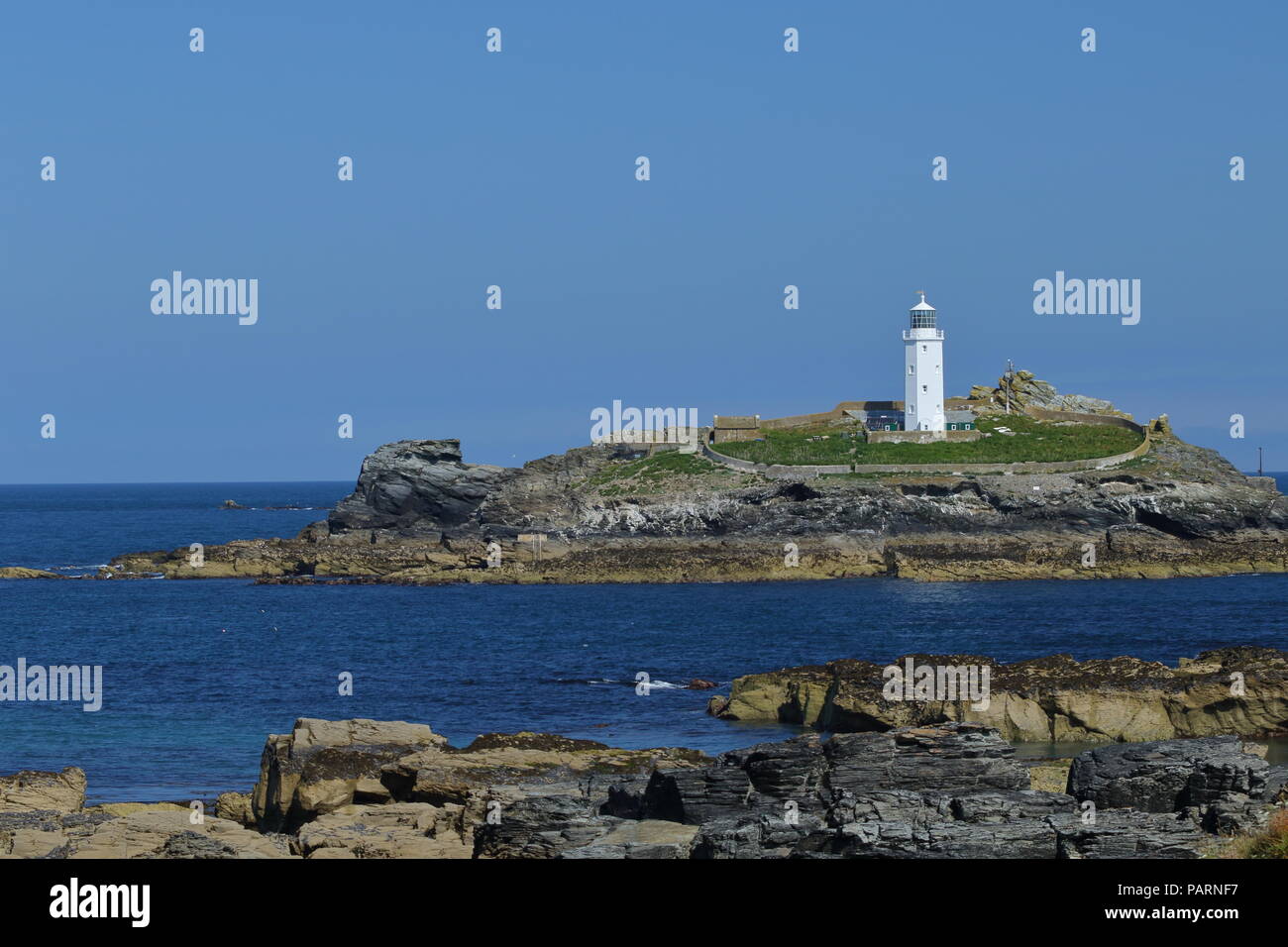 Godrevy Lighthouse,built by Trinity House in 1859 marking a dangerous reef off St. Ives called the Stones. Cornwall. UK. Stock Photo